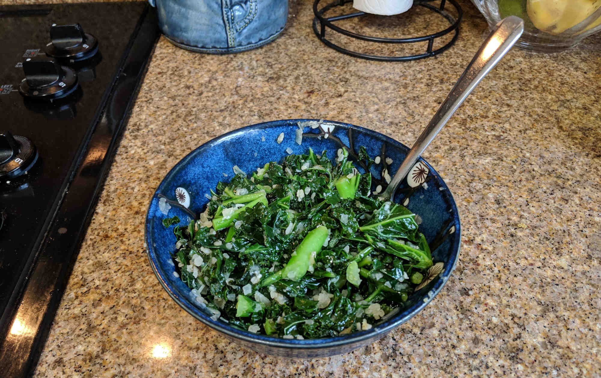 garlic sautéed kale in serving bowl